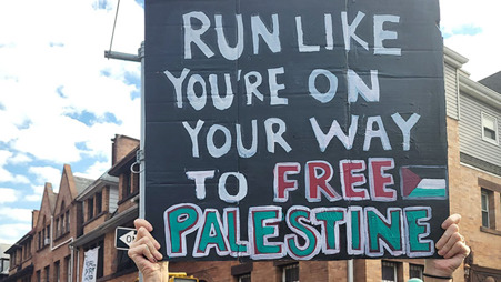 amos_trust_run_the_wall_gaza_2023_sign.jpg