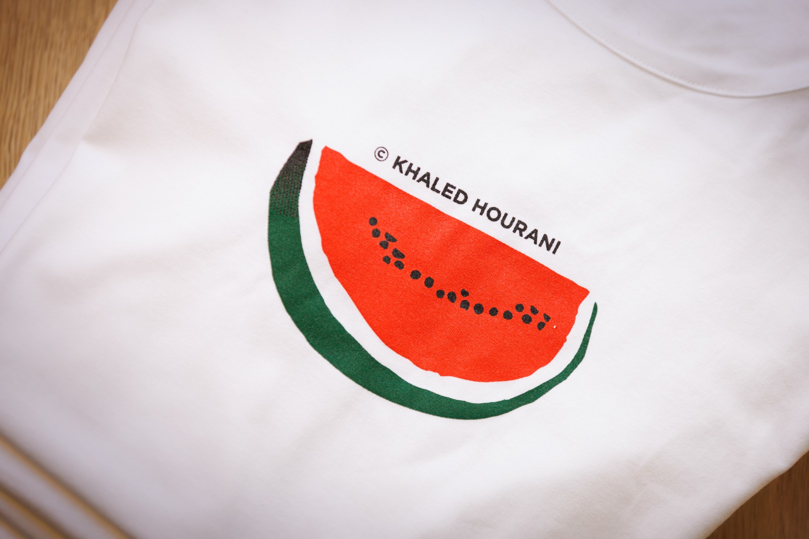 amos_trust_shop_khaled_hourani_watermelon_t_shirts_close_up_carousel.jpg